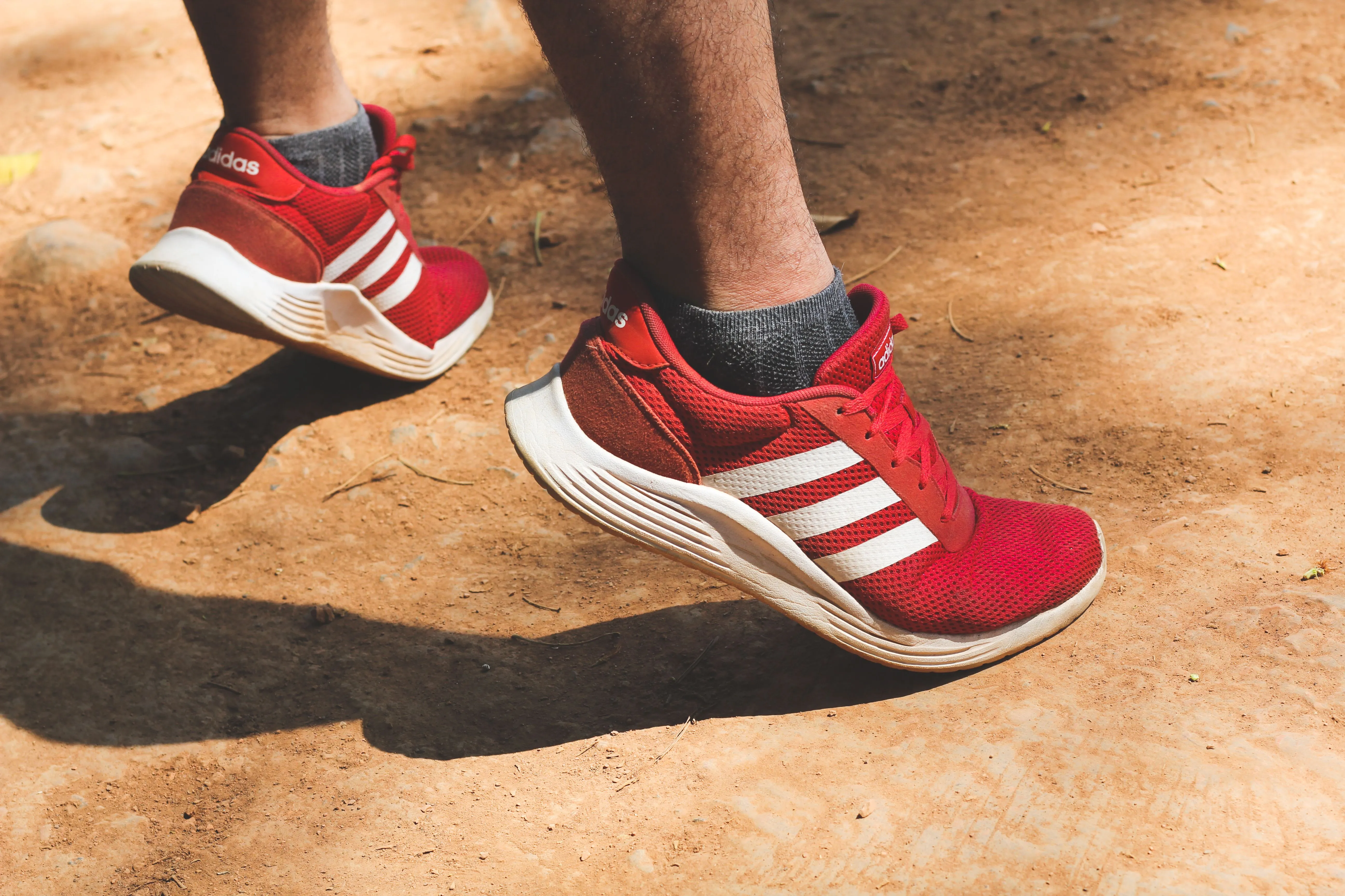 Photo of tennis shoes, marking the beginning of an outdoor walk