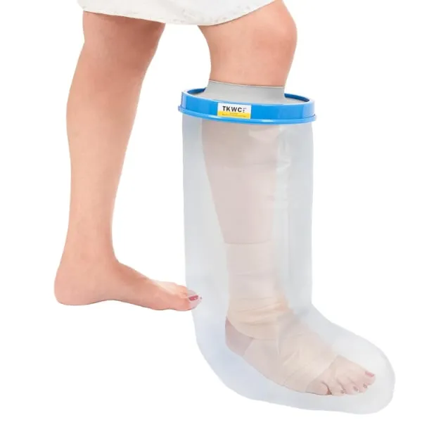 Clear waterproof cover with a blue stretch seal at the knee, worn over a bandaged leg